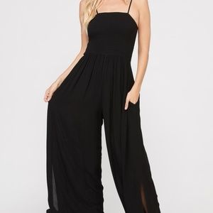 SMOCKED WIDE LEG JUMPSUIT WITH POCKETS
